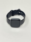 FitBit Versa 4 Graphite Aluminum Case With Black Infinity Band FB523 Very Good