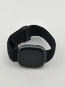 FitBit Versa 4 Graphite Aluminum With Black Fabric Band FB523 Used